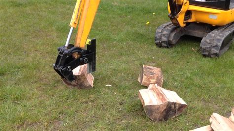 mini excavator wood splitter attachments|log splitters for mini excavators.